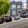 Rue en pente raide avec des voitures garées à San Francisco sur Bob Janssen