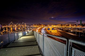 Avond uitzicht over stad Amsterdam van Fotografiecor .nl