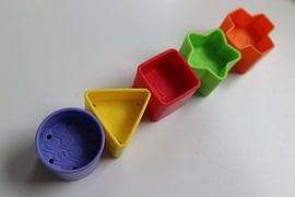 Speelgoedblokken naast elkaar