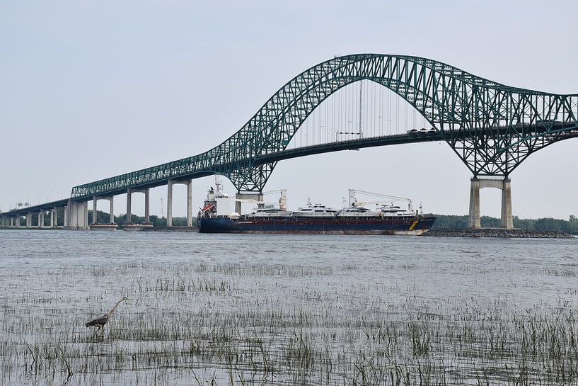 A boat under the Laviolette Bridge by Claude Laprise