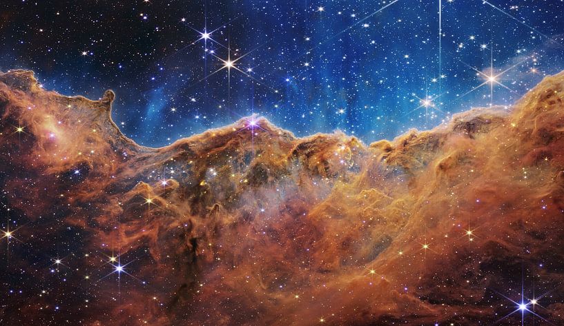 “Cosmic Cliffs” in the Carina Nebula by NASA and Space