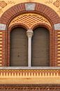 Historische gevel met gebogen ramen in warme tinten van Photography art by Sacha thumbnail