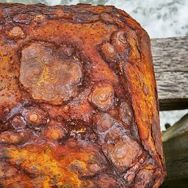 Rusty pile head at sea. by Johan Kalthof