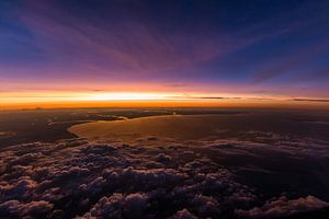 Coucher de soleil au-dessus des nuages sur Denis Feiner