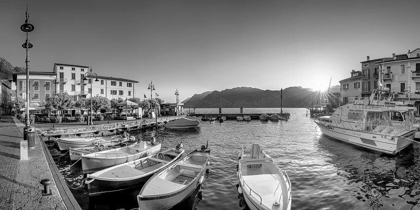 Sunset at the harbour of Malcesine on Lake Garda. Black and white image. by Manfred Voss, Black-White Photography
