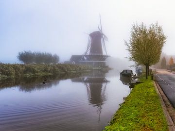 Bleskensgraaf - Photo nostalgique avec un moulin à échafaudage sur Kees Dorsman
