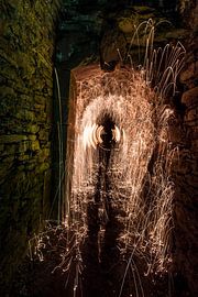 sparkling schadow in tunnel by Steven Langewouters