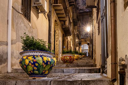 Colourful ceramic flower pots decorate the streets in Cefalu in Sicily