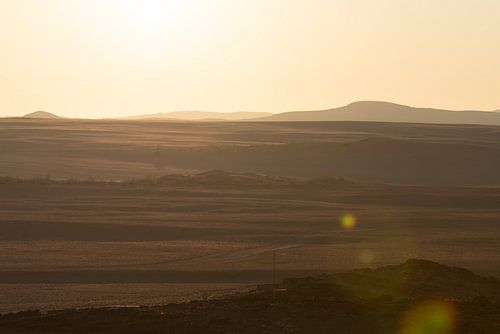 Zonsondergang boven de vlakte in pastelkleuren | Geel Oranje Afrika