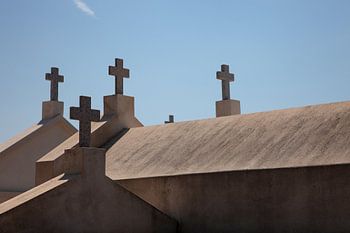 The quiet conversation between the crosses and the sky.