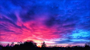 Lucht bij zonsondergang van Timon Scheuneman