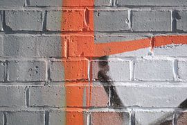 Detail eines Graffitis an der Hauswand eines Fabrikgebäudes von Heiko Kueverling