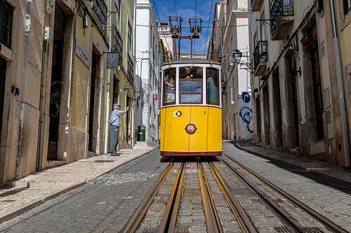 Old yellow tram in Lisbon