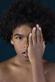 Boy with hand for face