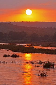 Sunrise in Africa van W. Woyke