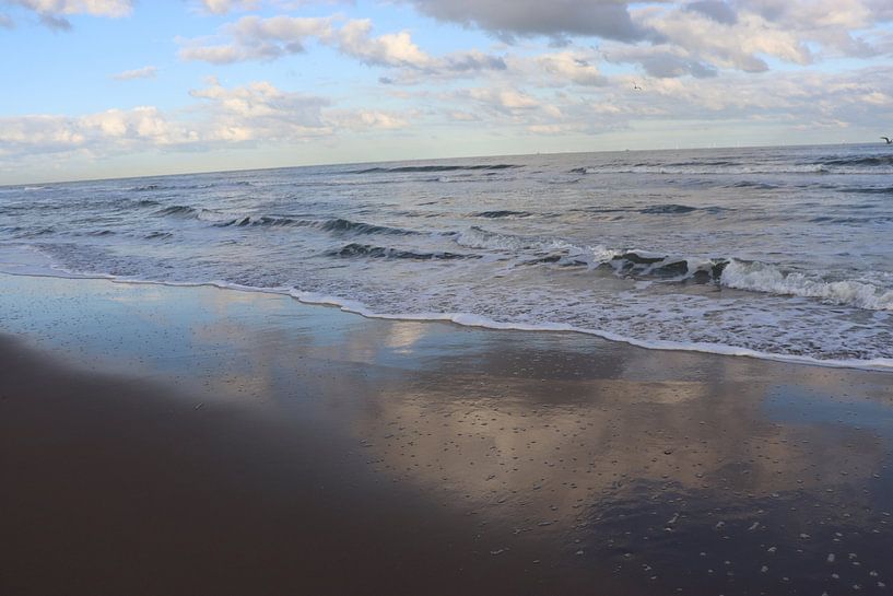 Clouds Reflecting in the Low Tide Waters of the Sea by jpgriffintheauthor