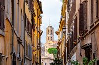 Italian street overlooking a church tower in Rome