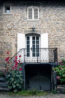 Rustic French house with balcony and French doors