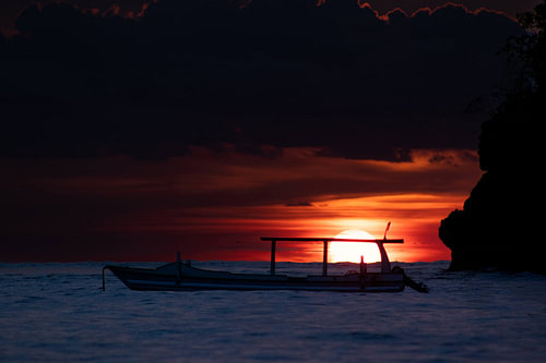 Glowing Horizon – A Boat in the Sunset