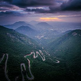 Scenic Mountain Road at Sunset – A Journey into Nature by Madan Raj Rajagopal