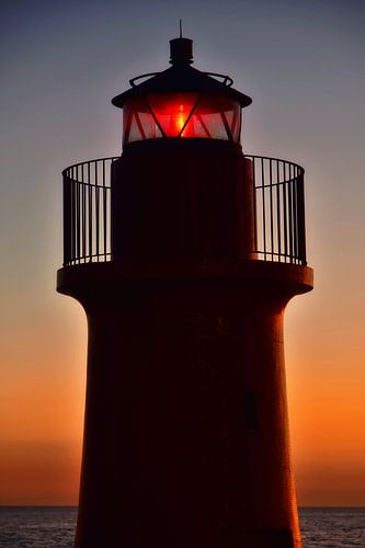 Vuurtoren in de zonsondergang