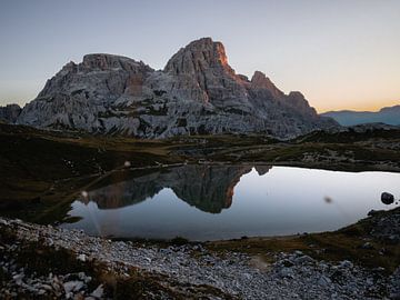 Sunrise over a mountain lake in the Dolomites by Roy Mosterd