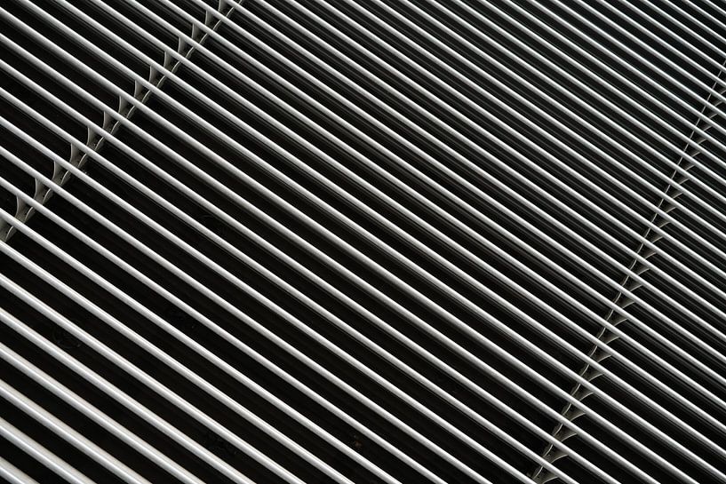 Closed blind on a window by Heiko Kueverling