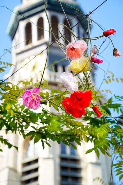Long Jan hidden behind flowers by Danny Tchi Photography