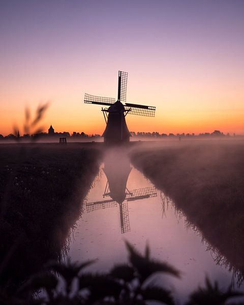 Mill in the fog in the early morning by Ewold Kooistra