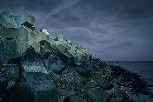 Concrete blocks protect harbor on coast (Descending side) by Rick Van der Poorten