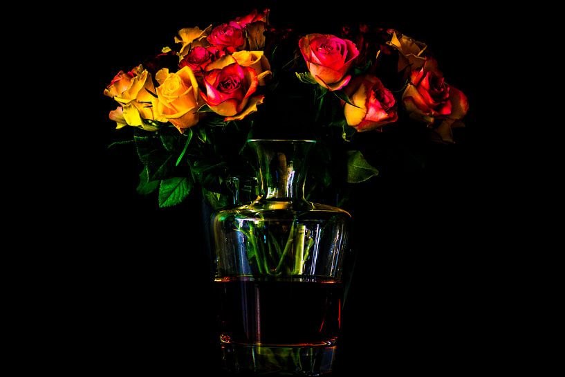 A still life of red and yellow roses with a twist by Jan Hermsen
