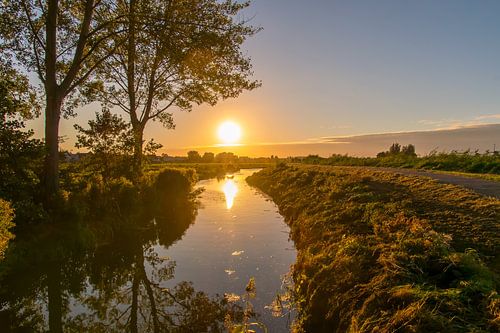 Soleil couchant dans l'Alblasserwaard