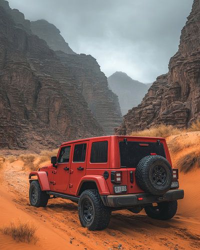 Roter Jeep Wrangler bei Sonnenuntergang in den Dünen
