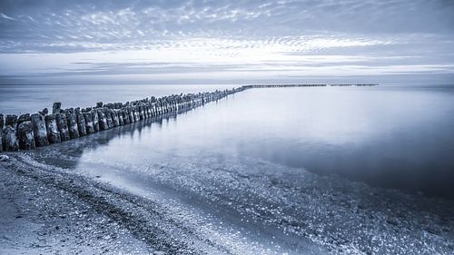 Zicht op een golfbreker bij Hindeloopen