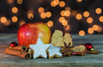 Advent and Christmas time with red apple fruit, cinnamon, anise by Alex Winter