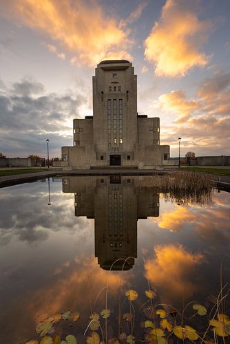 Radio Kootwijk reflected in the water at sunset