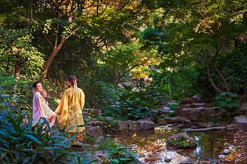 Chinese ladies by a stream by Anouschka Hendriks