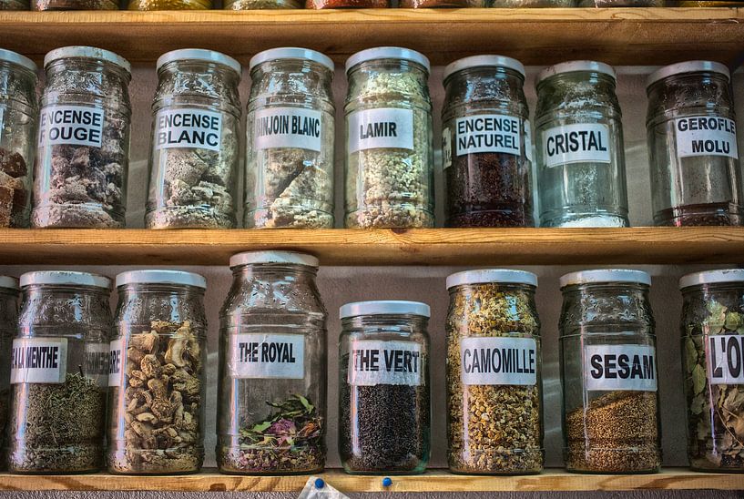 Glass jars with herbal essences and minerals by Patricia Hofmeester