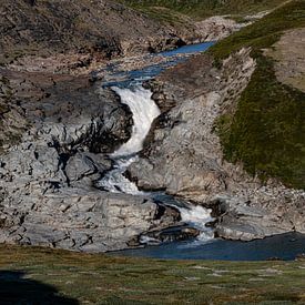 Waterfall on glacier by Kai Müller