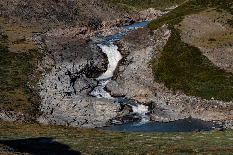 Waterfall on glacier by Kai Müller