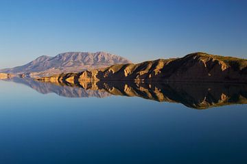 Mountain Reflection in Embalse de Negratin by Cornelis (Cees) Cornelissen