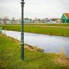 Lanterne de Zaanse Schans avec ciel néerlandais sur Rob van der Teen