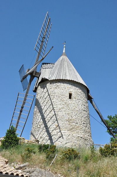 The Moulin de Cucugnan under a blue sky by Frank Photos