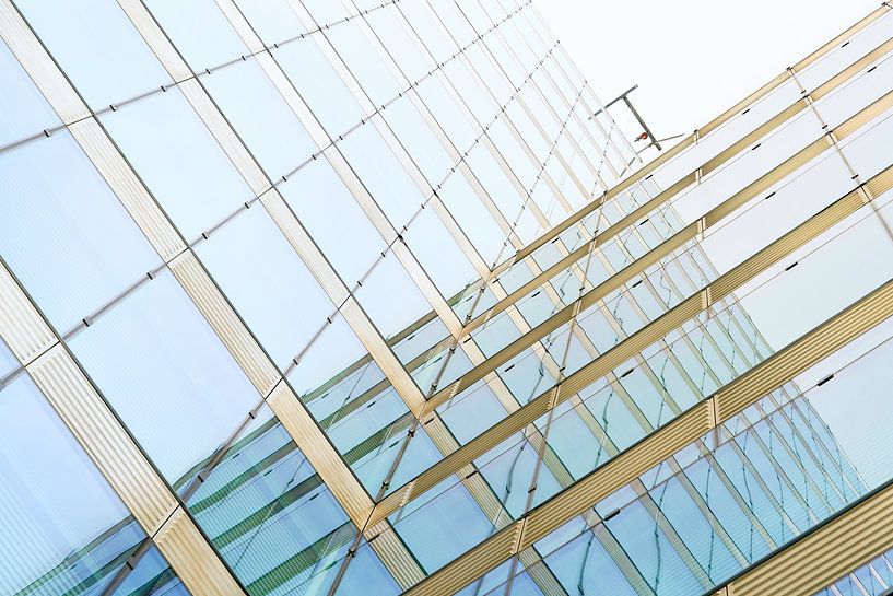 Glass façade of an office building in Berlin by Heiko Kueverling