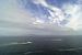 Wolken op Keem Beach van Babetts Bildergalerie