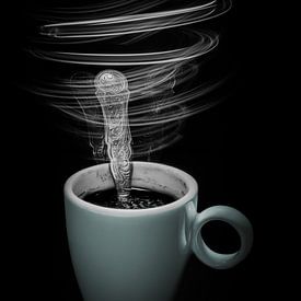 Kopje koffie met een roerend lepeltje dmv light painting van Jefra Creations