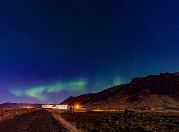 Noorderlicht boven IJsland van Patrick Groß