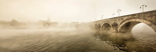Saint Servatius bridge in Maastricht at morning fog, the Netherlands.