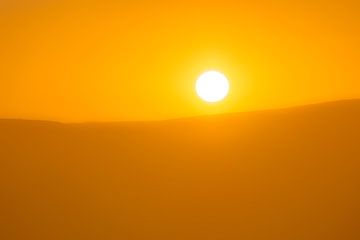 Zonsondergang in Afrika van Caroline Drijber