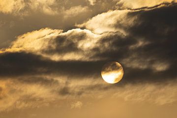 Evening sun behind the clouds by Andreas Müller